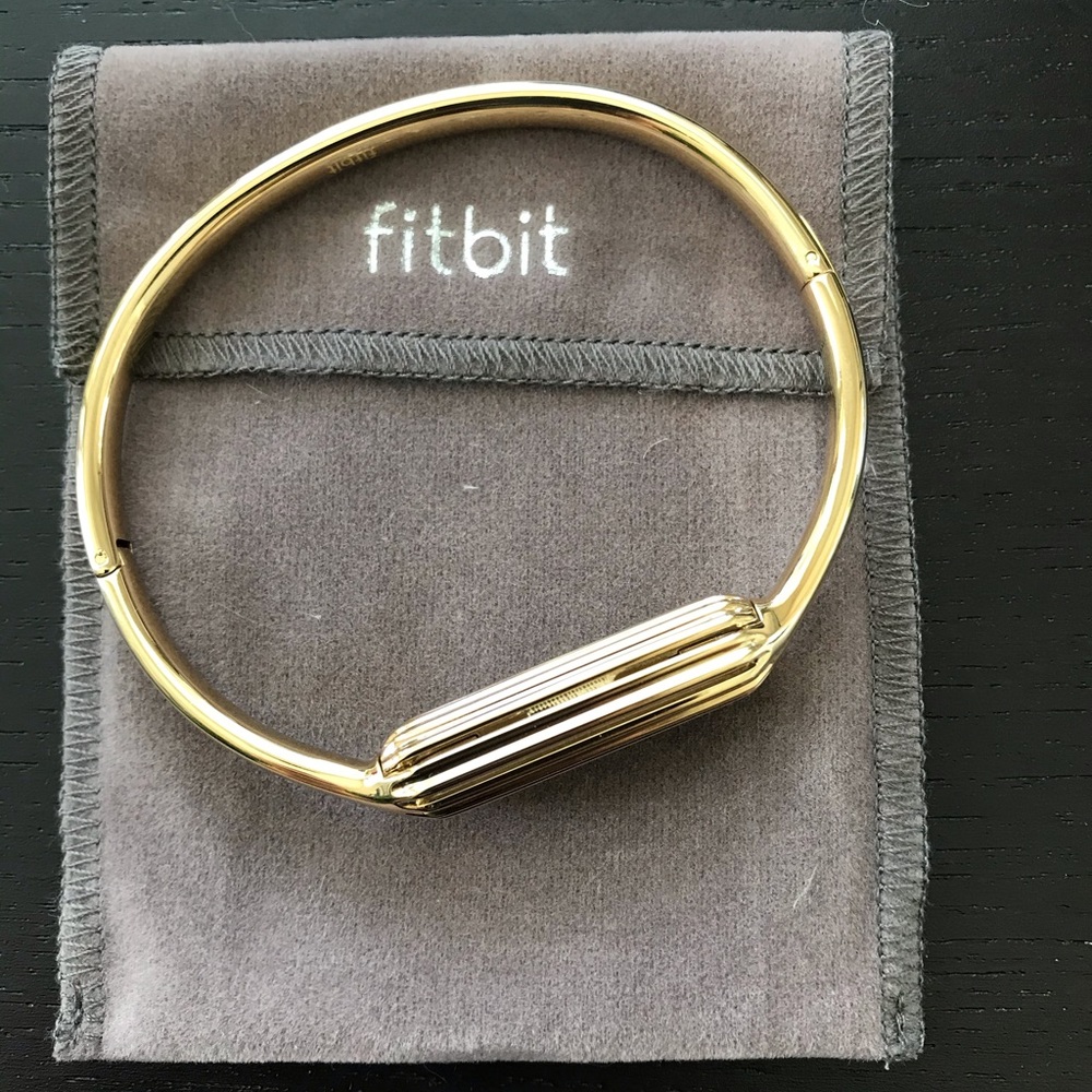 Brand new never worn Fitbit gold bracelet/ bangle